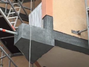 Reparación de estructura de hormigón de edificio junto al mar